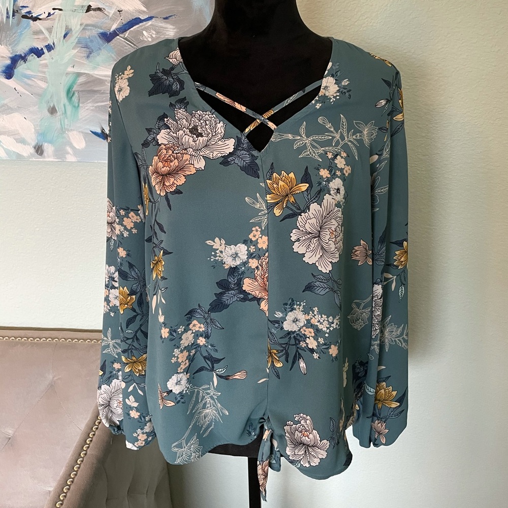 Floral knotted teal blouse